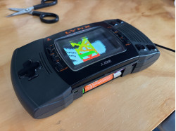 Atari Lynx 2 - Recapped and Modded with NiMh Charge Module, BennVenn IPS Screen and New Speaker